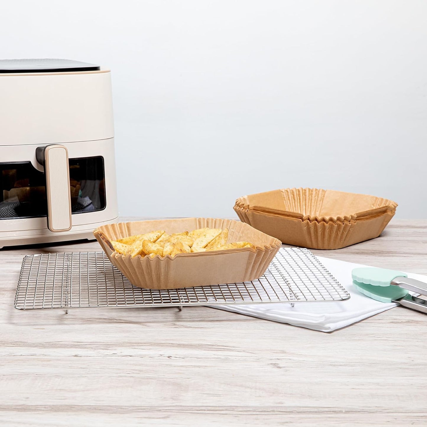 Restaurantware-Pastry Tek 6.3 x 6.3 x 1.8 Inch Air Fryer Liners, 100 Square Air Fryer Baskets - No-Stick Silicone Coating, Unbleached, Food-Grade Paper Liners, For Steamer, Microwave, Oven, Fry Pan
